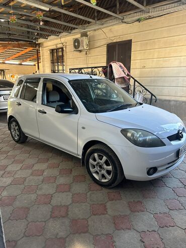 срочно продать машину: Mazda Demio: 2002 г., 1.3 л, Автоматтык, Бензин, Хетчбек