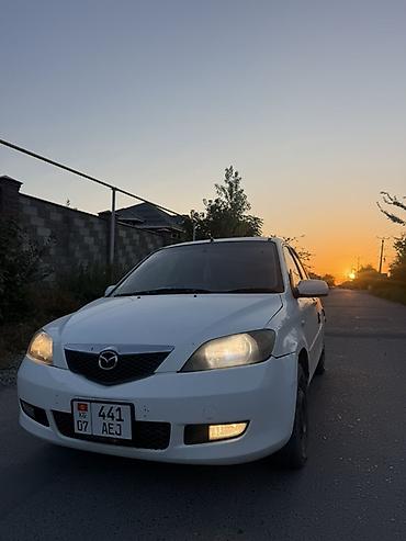 chek it: Mazda Demio: 2003 г., Автомат, Бензин, Хэтчбэк — 1