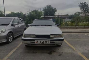 автомобиль пассат: Mazda 626: 1991 г., 2.2 л, Механика, Бензин, Хетчбек