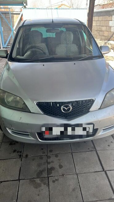 авто гитара: Mazda Demio: 2003 г., 1.3 л, Автомат, Бензин, Седан