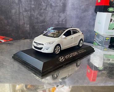 Avtomobil modelləri: Коллекционная модель Hyundai i30 5 door white 2012 Pino B&D Scale — 11