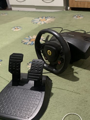 Другие аксессуары: Руль и педали газа и тормоза . Руль THRUSTMASTER T80 FERRARI 488GTB