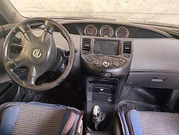 каракол мото: Nissan Primera: 2002 г., 2 л, Механика, Бензин, Хэтчбэк — 6