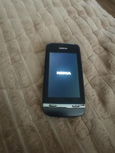 auto addict beograd: Nokia touchscreen telefon sa fizičkim tasterima za poziv i prekid — 4