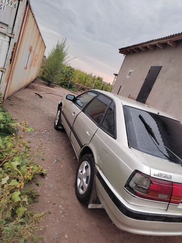 дамкрат для авто: Mazda 626: 1991 г., 2 л, Механика, Бензин, Седан