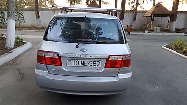 ford focus 2000: Kia Carens: 2 l | 2003 il Van/Minivan — 3