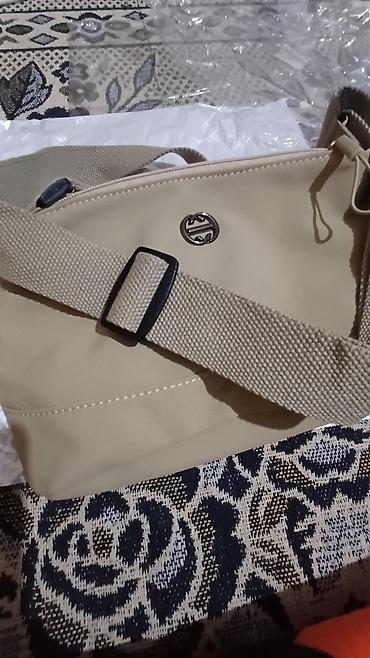 Классические сумки: Продаётся женская сумочка с длинным ремнём,материал плащёвка мягкая at lalafo.kg — 4 Классические сумки: Продаётся женская сумочка с длинным ремнём,материал плащёвка мягкая — 4