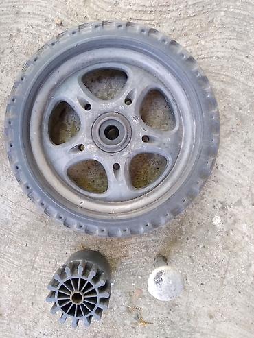 mima buggy: Zadnji tocak za decija kolica spoljni precnik 23 cm.,otvor za osovinu — 1