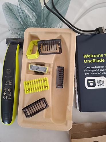 samsung s3550 shark slider: Philips OneBlade ülgüc və trimmer dəsti Xüsusiyyətlər: - Model — 3