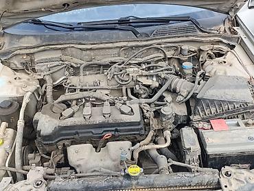 чехлы в авто: Nissan Almera: 2000 г., 1.5 л, Механика, Бензин, Хэтчбэк — 4