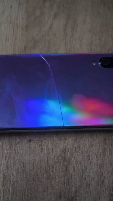 самые дешёвые телефоны в бишкеке: Xiaomi, Mi 9 SE, Б/у, 128 ГБ, цвет - Фиолетовый, 2 SIM