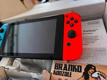 Nintendo Switch: 🎮 Nintendo Switch 32GB + 256GB microSD ✨ Perfektno stanje — pažljivo — 7