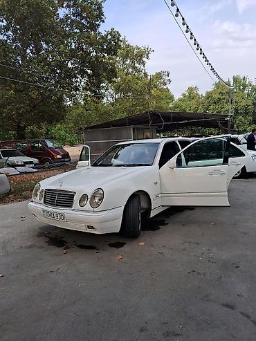 Mercedes-Benz: Mercedes-Benz E-Class: 2.3 l | 1996 il Sedan — 15