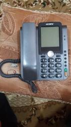ratsiya telefon: Stasionar telefon Simli, İşlənmiş