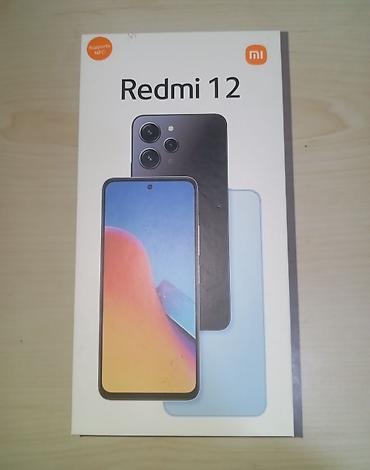 купить сяоми 12: Redmi 12, 128 ГБ, цвет - Черный, Кредит — 1