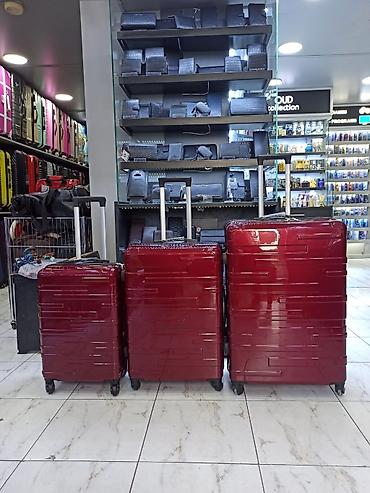 Çamadanlar: Qırmızı sərt örtüklü çamadan dəsti - 3 ölçü: kiçik (kabin ölçüsü) — 1
