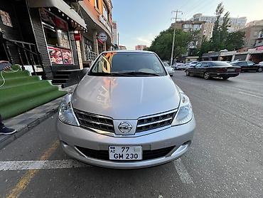 bort baqaj: Nissan Tiida hatchback – gümüşü rəng Xüsusiyyətlər və təchizat: - — 1