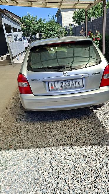 li ion: Mazda 323: 2002 г., 1.6 л, Автомат, Бензин, Седан — 5