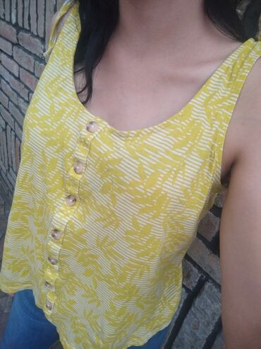 majice otvorenih leđa: Papaya majica vel xl
super ocuvana