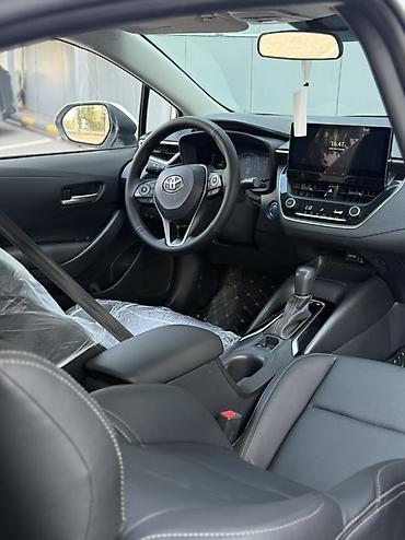 zero x neo: Toyota Corolla: 2023 г., Гибрид, Седан — 7