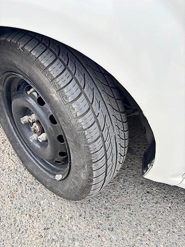 2 el motor: Chevrolet Aveo: 1.4 l | 2011 il 274200 km Sedan — 10