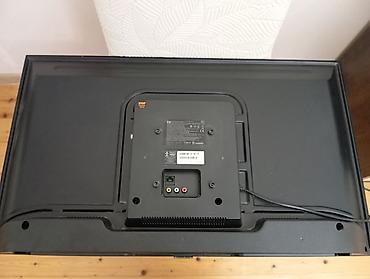 redmi pad 6: **Xiaomi televizor** Qara çərçivəli Xiaomi televizor. Şəkillərdə — 2