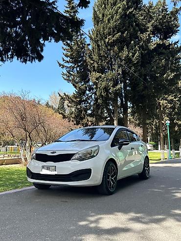 opel duman: Kia Rio: 1.4 l | 2013 il Sedan — 1