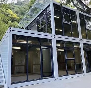 Продажа торговых контейнеров: Модульные контейнер‑павильоны с панорамным остеклением Назначение: - — 2