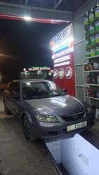 Mazda: Mazda 323: 2003 г., 1.6 л, Механика, Бензин, Универсал — 9