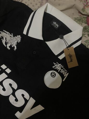 бренд одежда: Черная мужская рубашка поло от Stussy с контрастным белым отложным