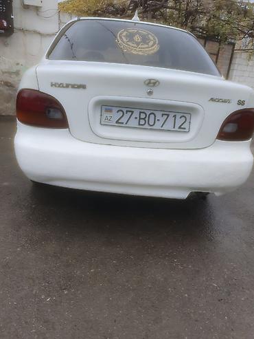 tap az kondisioner: Hyundai Accent: 1.5 l | 1995 il Sedan — 5