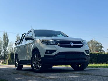 машины до 200 тысяч автомат: SsangYong Sports — это современный пикап белого цвета, сочетающий в