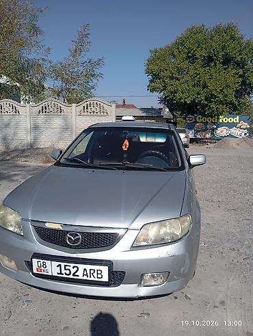 мазда демио шаравой: Mazda 323: 2003 г., 1.6 л, Механика, Бензин, Универсал — 1