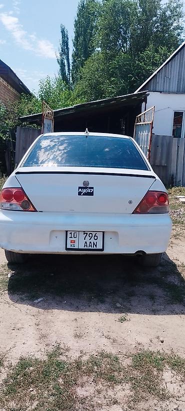 27 5: Mitsubishi Lancer: 2000 г., 1.5 л, Вариатор, Бензин, Седан — 2