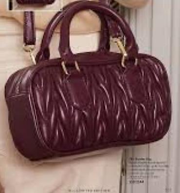 Elegantna ženska torba u boji burgundca (tamno bordo). - Materijal
