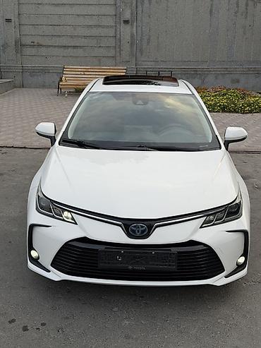 калпаки на диски: Toyota Corolla: 2021 г., Гибрид, Седан — 2