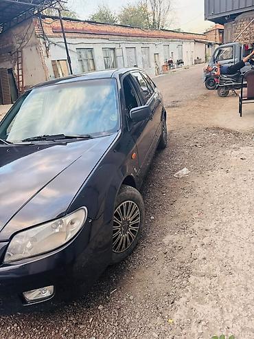 мазда 323 фк: Mazda 323: 2002 г., 1.6 л, Автомат, Бензин, Хэтчбэк — 2