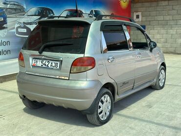 генератор на запчасть: Хэтчбек Daewoo Matiz, представленный в светло-серебристом цвете