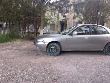 Daewoo: Daewoo Nubira: 1997 г., 1.6 л, Механика, Бензин, Седан