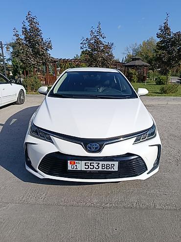 до 250000: Toyota Corolla: 2019 г., 1.8 л, Автомат, Гибрид, Седан — 1