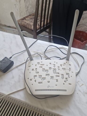 Настольные ПК и рабочие станции: TP-Link istehsalı olan bu simsiz router, yüksək sürətli internet