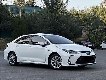 Toyota Corolla: 2019 г., 1.8 л, Вариатор, Гибрид, Седан at lalafo.kg Toyota Corolla: 2019 г., 1.8 л, Вариатор, Гибрид, Седан