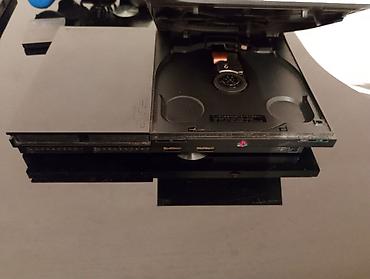 playstation 5 çantası: PlayStation 2 Slim konsol paketi Məzmun: - Sony PlayStation 2 Slim — 4
