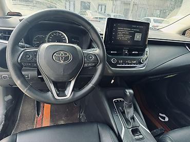 byd e1: Toyota Corolla: 2021 г., 1.8 л, Вариатор, Гибрид, Седан — 8