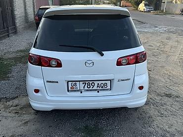 w211 e500: Mazda Demio: 2003 г., 1.5 л, Автомат, Бензин — 5