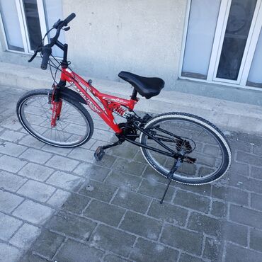 Другое для спорта и отдыха: Продаю велосипед состояние отличное цвет красный кореец 2х подвесный