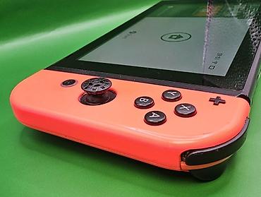 Nintendo Switch: Игровая консоль Nintendo Switch с разноцветными Joy‑Con (левый — — 9