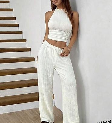 Kompleti: Ženski komplet – top bez rukava + široke pantalone. - Top: pripijena na lalafo.rs — 6 Kompleti: Ženski komplet – top bez rukava + široke pantalone. - Top: pripijena — 6