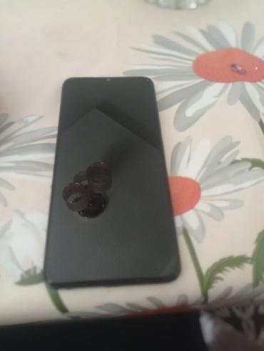 i7 4790k prosessor: Smartfon – qara rəngdə, böyük tamekranlı dizayn - Ön hissə: kənarlara — 3