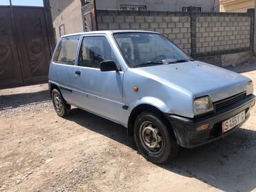 zhen tuniki: Daihatsu Cuore: 1989 г., 0.8 л, Механика, Бензин, Купе